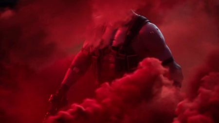 solid snake skulks through a red cloud of smoke