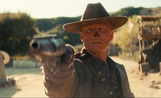 The Ghoul from Fallout pointing a gun