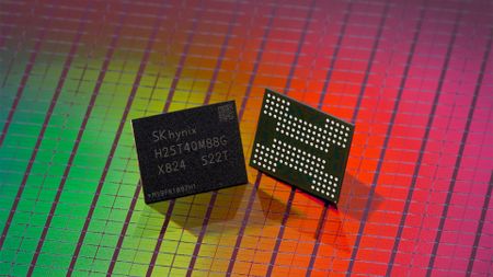 A promotional image by SK Hynix, showing two 321-layer QLC NAND flash modules with a flash memory wafer in the background.