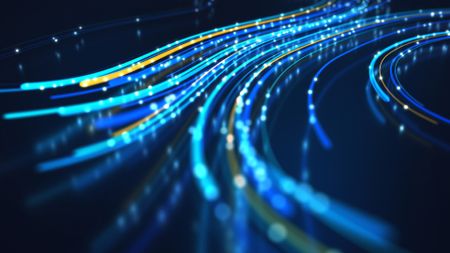 Close up of network data flowing on black background.